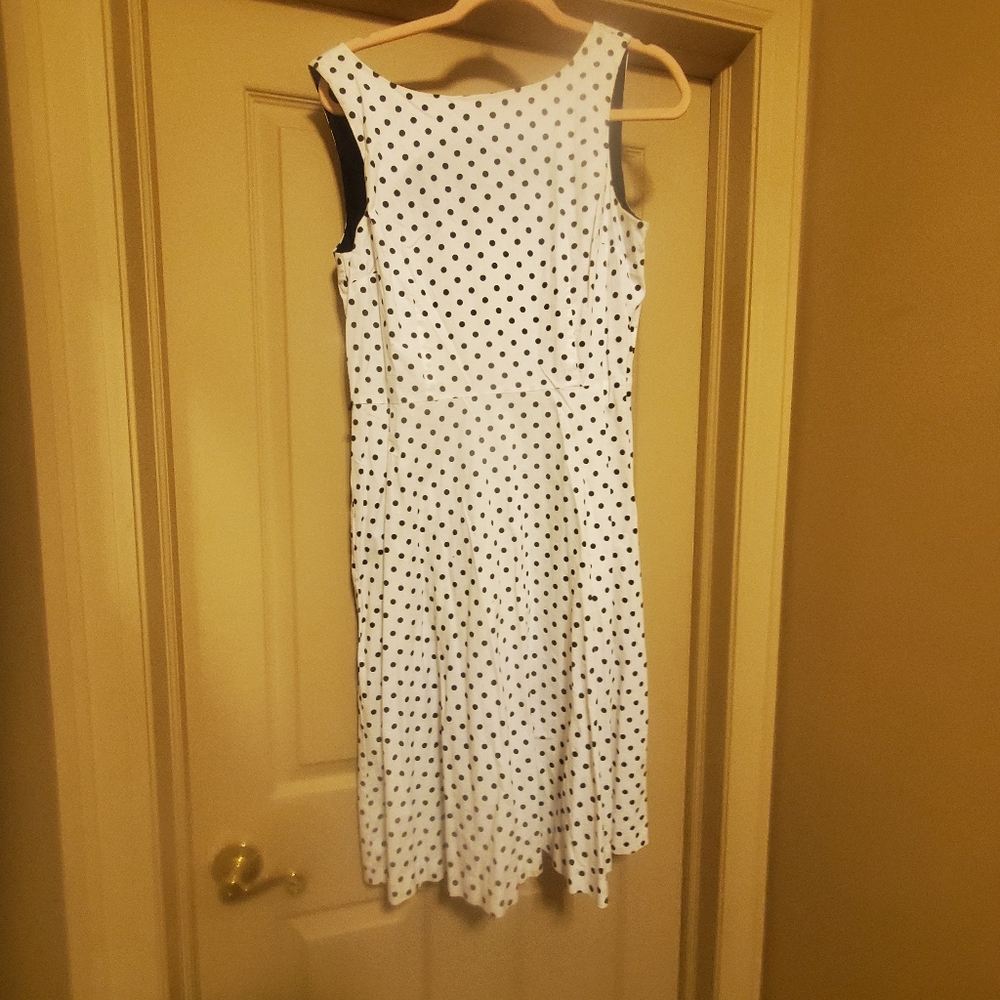 White dress black polka-dots